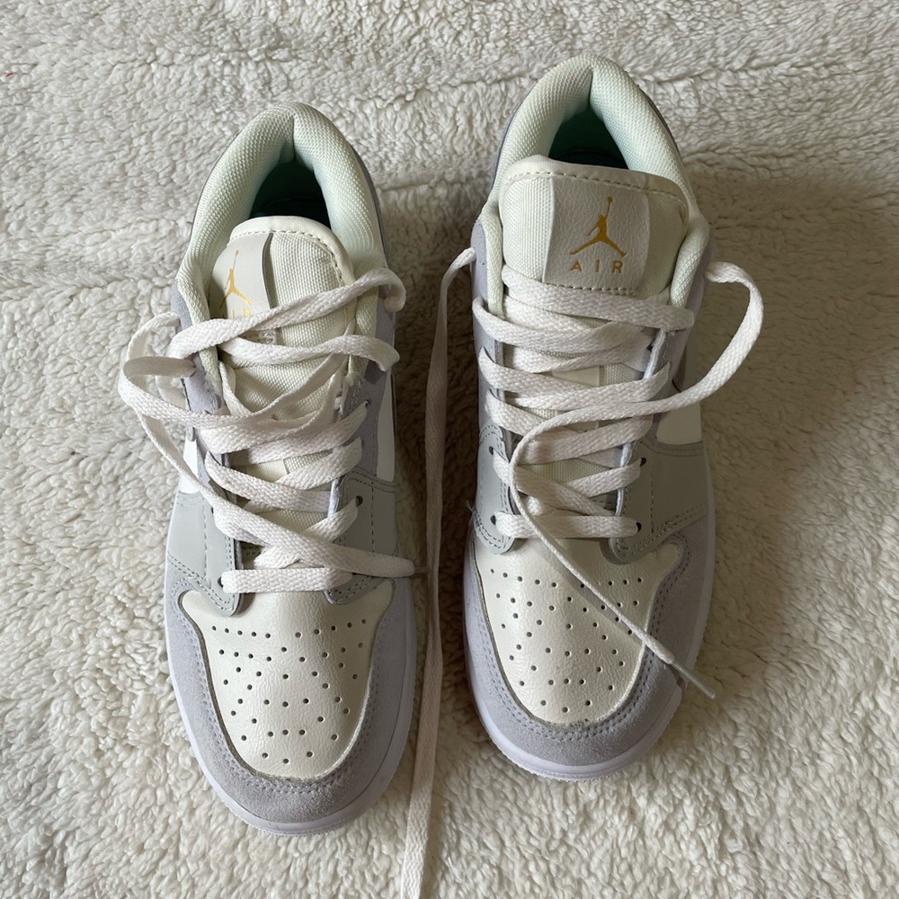 Jordan women White and Gray Sneakers with Gold Accents size 8